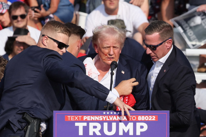 Donald Trump injured but safe in apparent assassination bid; shooter killed by Secret Service agents