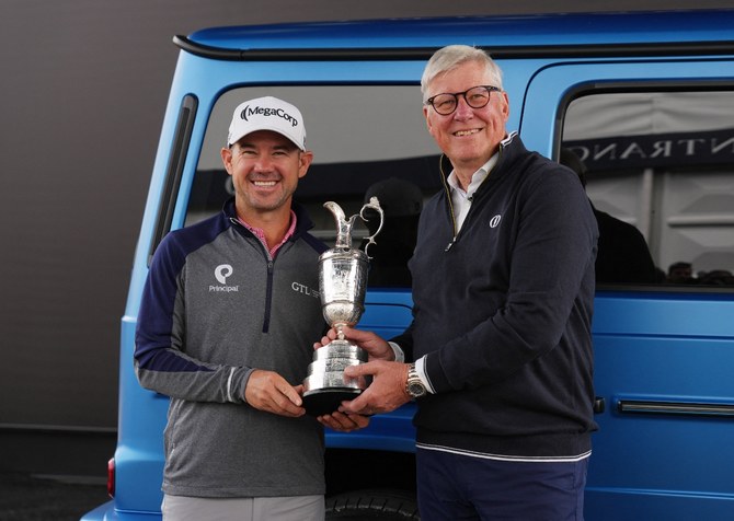 Brian Harman starts his British Open title defense by returning the claret jug