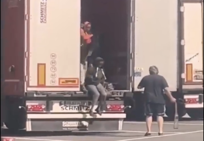 Video of driver lashing migrants in back of lorry sparks indignation in Italy