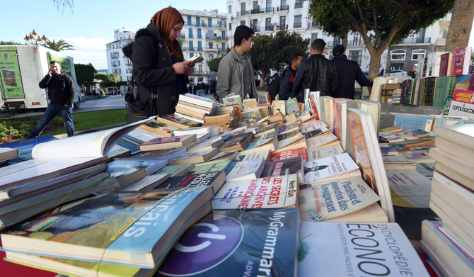 Readers visit a book stall on a street  in the Algerian capital Algiers. (AFP file photo)