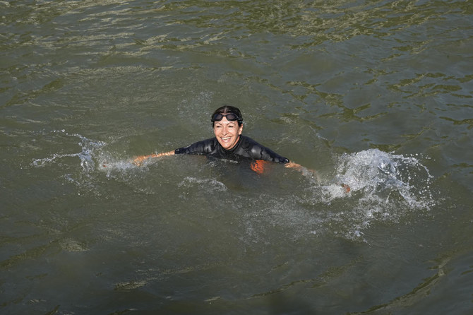 Paris mayor dips into the Seine River to showcase its improved cleanliness before Olympic events