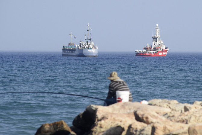 An Open Arms ship and ship Jennifer, of the World Central Kitchen carrying food aid for the Gaza Strip, prepare to set sail.