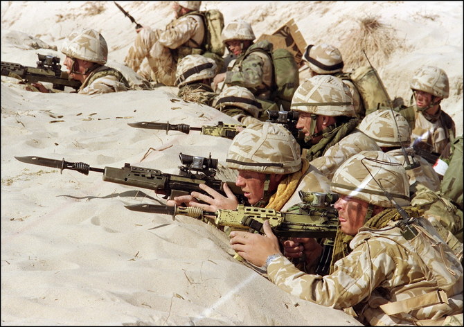 British soldiers from the First Stafford, well known as the “Desert Rats,” stand in a trench on January 6, 1991.
