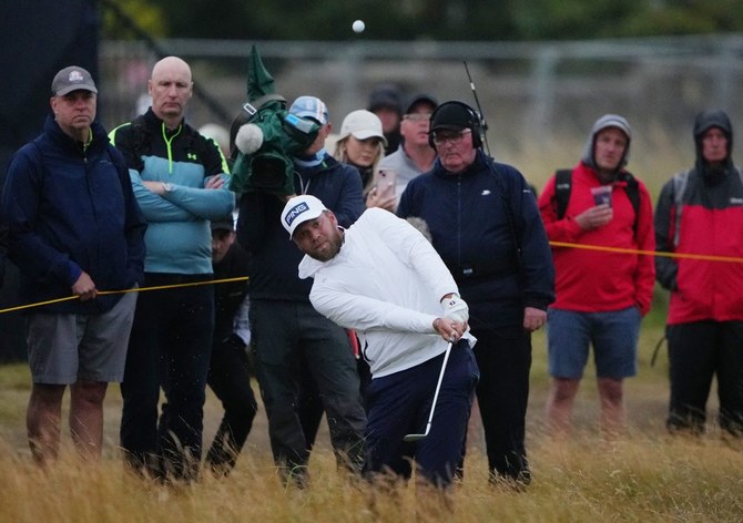 England’s Brown birdies last to lead The Open