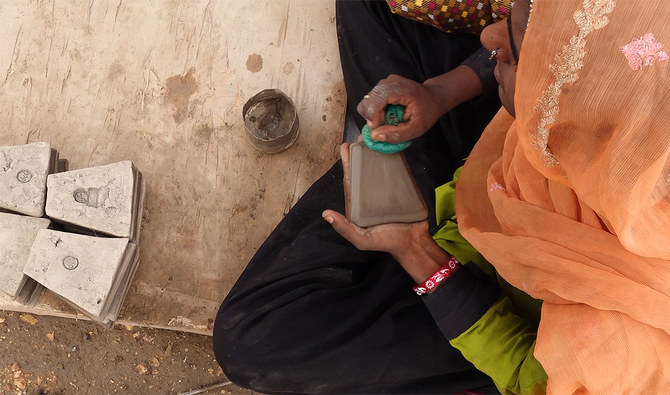 Former beggarwomen mold new lives through tilemaking in Pakistan’s Sindh