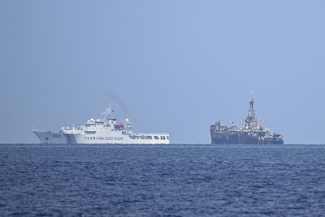 Philippines says has ‘arrangement’ with Beijing on South China Sea, but no ship inspections