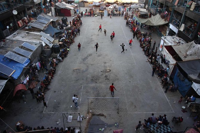 ‘We love life’: Gaza’s war-weary footballers play on