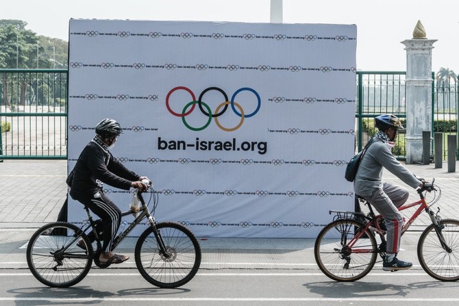 Palestinian Olympic team greeted with cheers and gifts in Paris