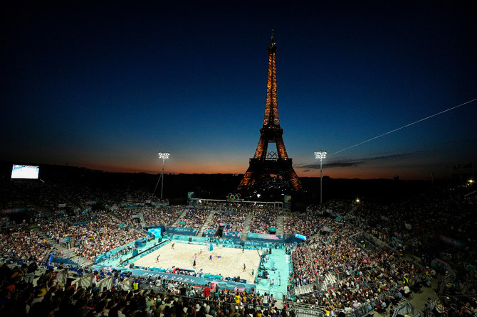 Beach volleyball at Eiffel Tower Stadium draws the crowds looking for the perfect social media post