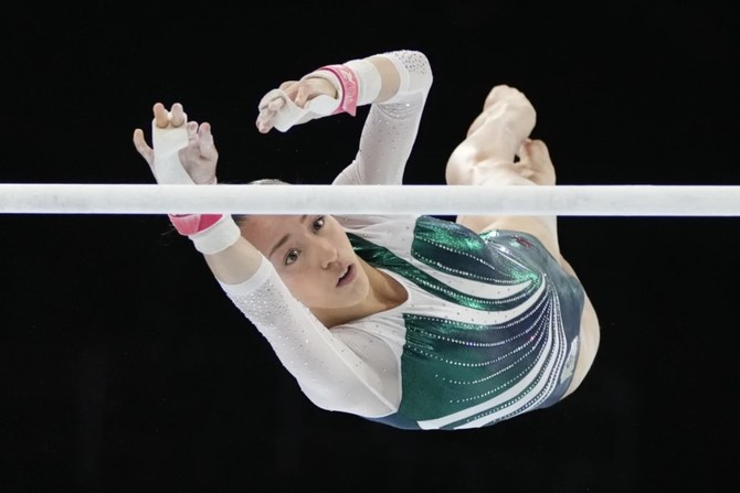 Nemour impresses with her bars routine at Olympics after switching to the Algerian team 