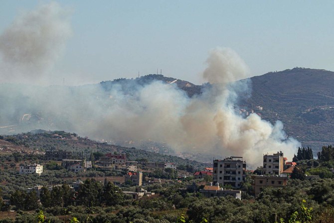 Smoke billows from a site targeted by the Israeli military in the southern Lebanese border village of Kafr Kila on July 29, 2024