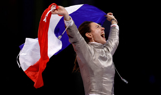 A French fencing queen is crowned in gold at the Grand Palais