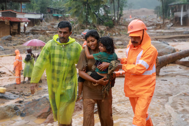 Rescuers scramble to find survivors after dozens killed in Kerala landslides