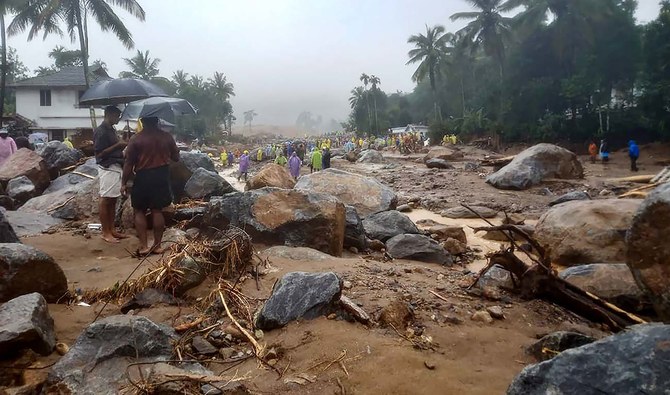 Rescuers scramble to find survivors after dozens killed in India landslides
