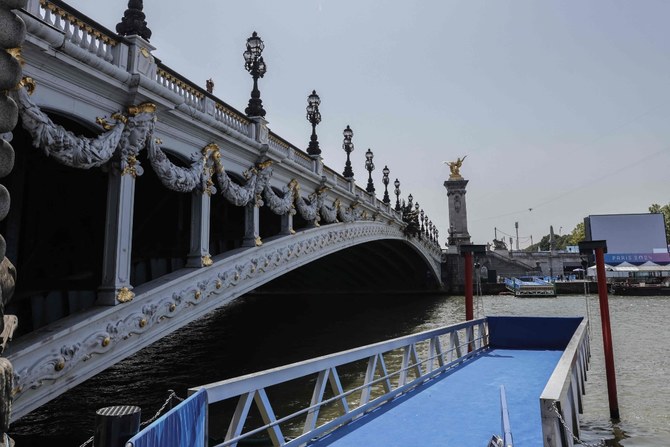 Olympic triathletes will swim in Paris’ Seine River after days of concerns about water quality