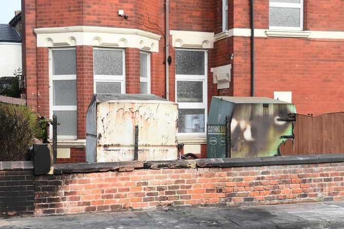 Damage is seen outside the Southport Islamic Society Mosque in Southport, northwest England, on July 31.