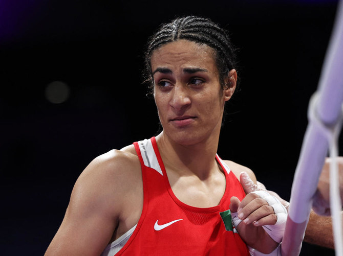 Algeria boxer who had gender test issue wins first Olympic fight in Paris when opponent quits