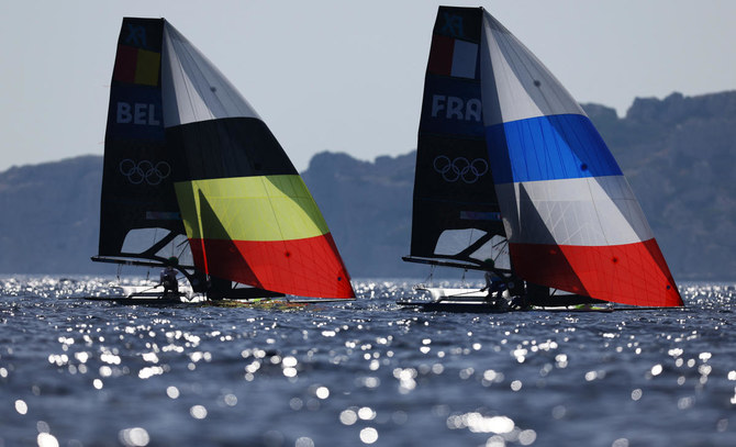 A lack of wind forces scuttles first Olympic sailing medal races, leaving sailors broiling