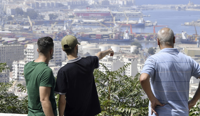 A youth point towards the ports in Algiers, Algeria, Monday, July 29, 2024. (AP)