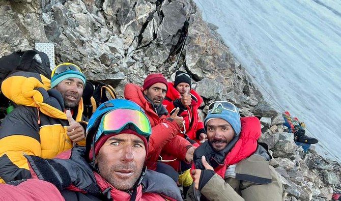 Pakistani climbers retrieve body of porter from K2 bottleneck after a year