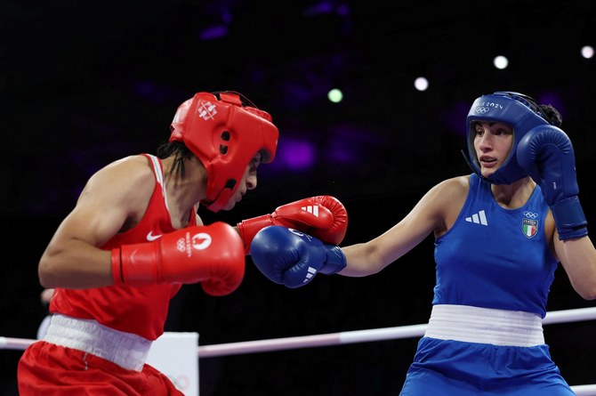 Boxing body offers prize money to beaten Italian amid gender row