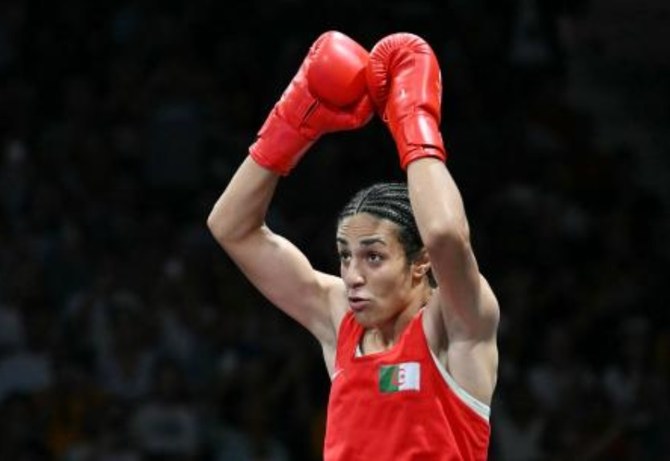 Algerian boxer Imane Khelif clinches medal at Paris Olympics after gender outcry
