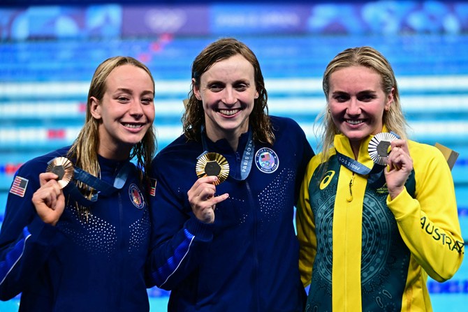 Ledecky makes Olympic history as McIntosh stars again in pool