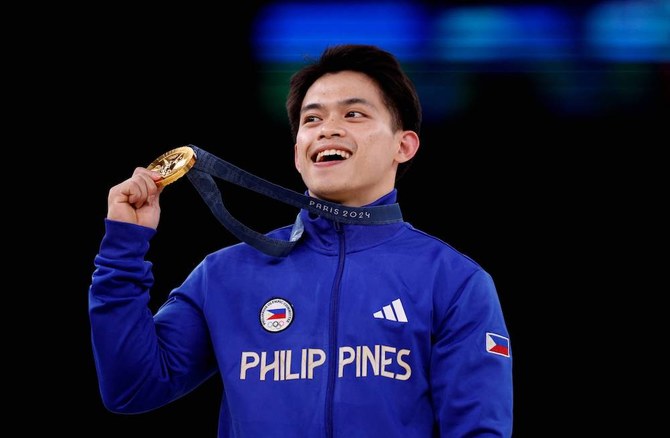 Philippines showers gymnast Carlos Yulo with praises, gifts after double Olympic gold