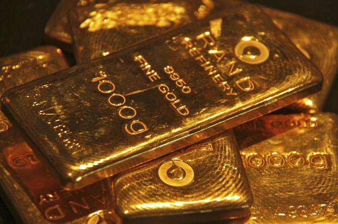 Gold slides over 2% as wider market rout spills over