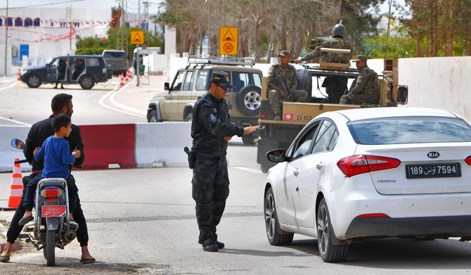 Tunisian forces stand guard in Djerba, on May 10, 2023. (AFP)