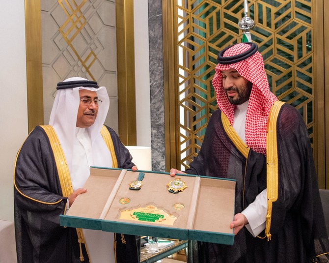 Saudi Crown Prince Mohammed bin Salman is presented with the Leader’s Medal by the Speaker of the Arab Parliament in Jeddah.