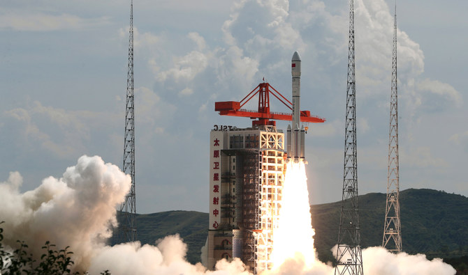 China launches rocket carrying new satellites