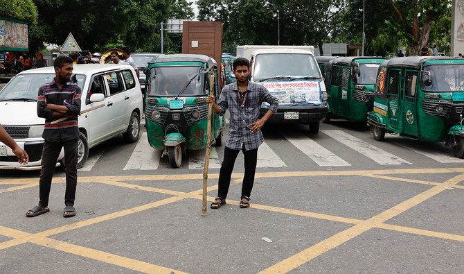 As police strike, Bangladesh students cop traffic duty