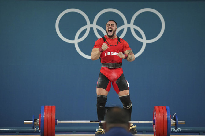 Bulgaria weightlifter wins gold 15 months since a hotel sink fell and severed an Achilles tendon