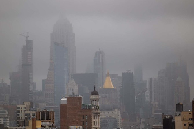 Midtown Manhattan sits under a layer of heavy clouds on August 09, 2024, in New York City. (AFP)