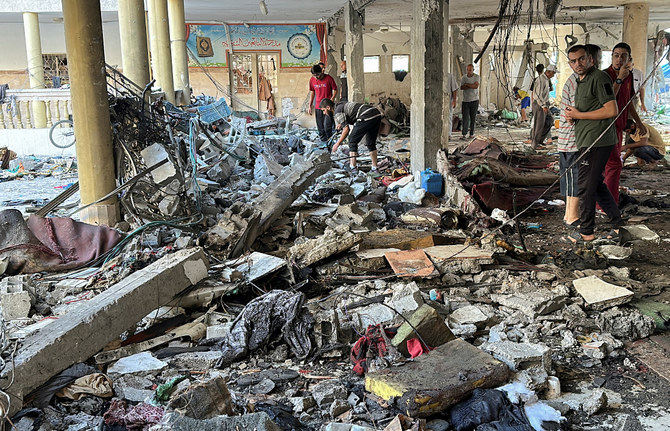 Israeli strike kills nearly 100 in Gaza school refuge, civil defense officials say