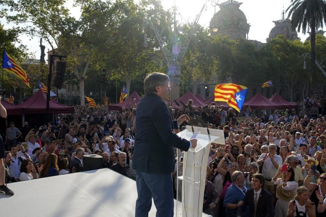 Fugitive Catalan separatist leader says would not surrender