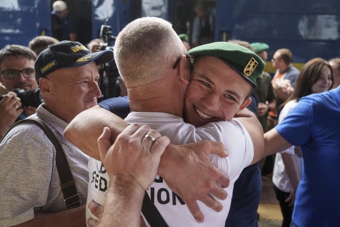 Oleksandr Khyzhniak, Ukraine’s gold medal-winning boxer, returns home and lifts spirits amid war