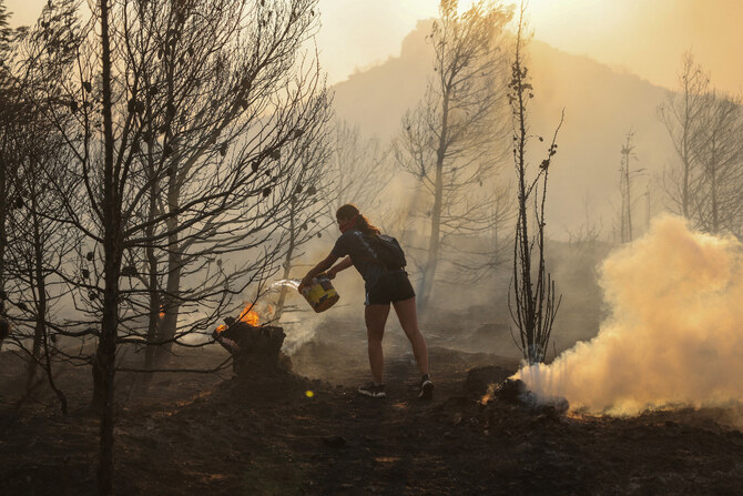 Greek wildfire rages near Athens; towns, hospitals evacuated