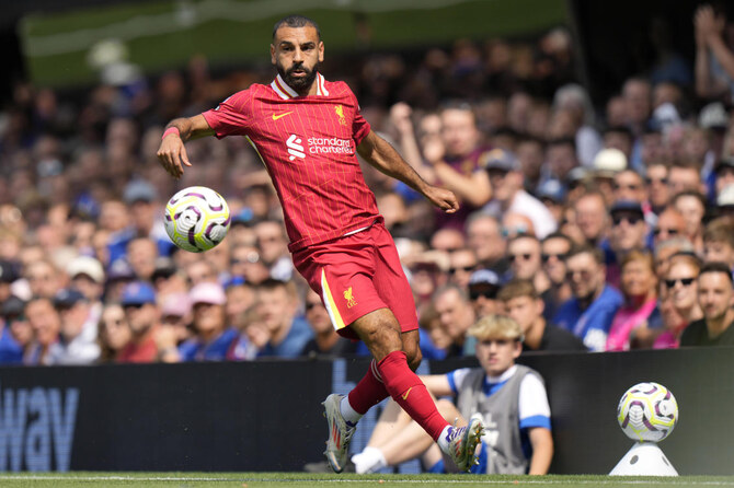 Liverpool’s new era under Slot begins with a win at Ipswich and a scoring record for Salah