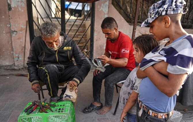 Besieged Gazans share shoes, wear same clothes for months