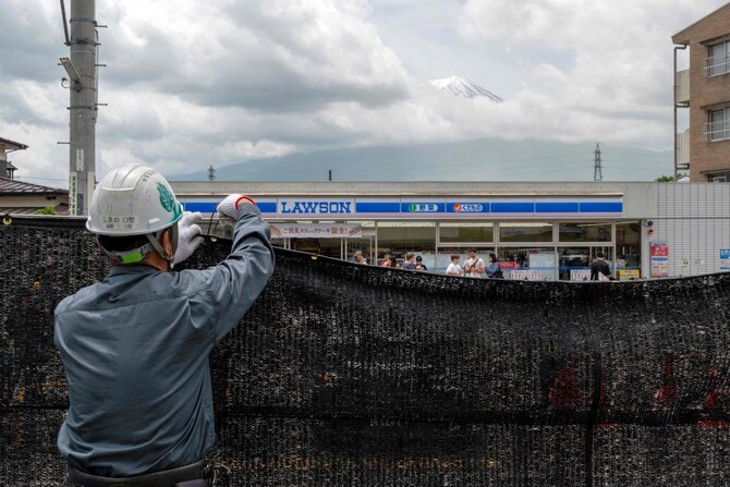 With tourists away, Mount Fuji barrier taken down in Japan