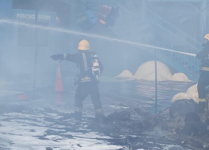 Saudi Civil Defense personnel extinguish a fire that broke out at a closed entertainment complex in Jeddah’s Ash Shati district.