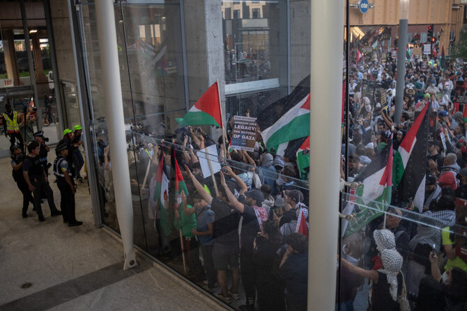 Crowds of pro-Palestinian protesters rally and march outside Democratic convention’s 3rd night