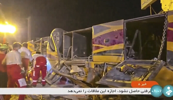 Pakistan flies home the injured and the bodies of 28 Shiite pilgrims killed in a bus crash in Iran