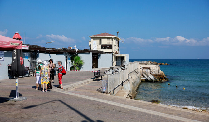 Israeli beachgoers try to brush off Hezbollah threat