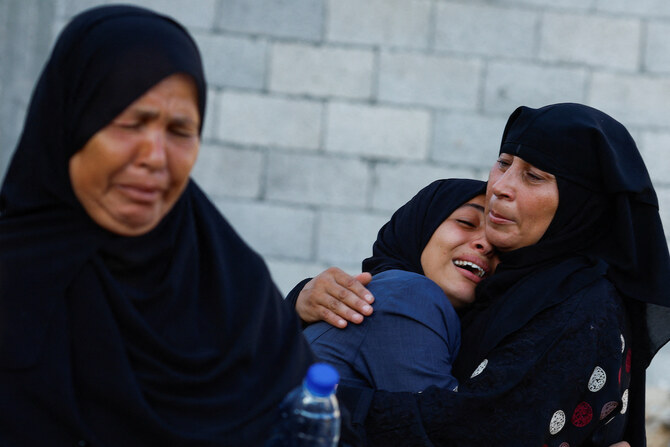 Mourners react during the funeral of Palestinians killed in Israeli strikes in Khan Younis, southern Gaza Strip August 26, 2024.