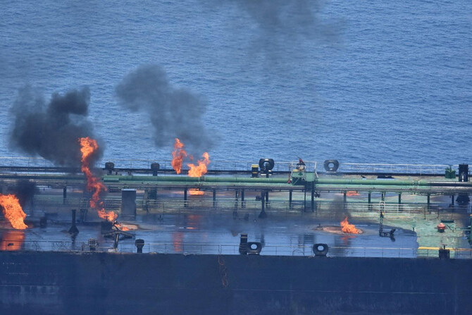 Flames and smoke rise from the Greek-flagged oil tanker Sounion, which has been on fire since August 23, on the Red Sea.