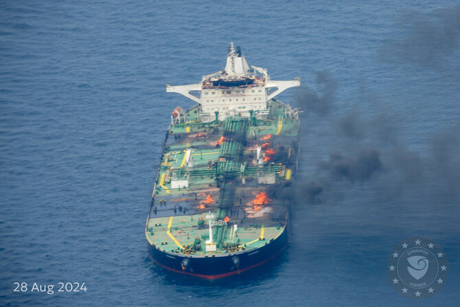 Flames and smoke rise from the Greek-flagged oil tanker Sounion, which has been on fire since August 23, on the Red Sea.