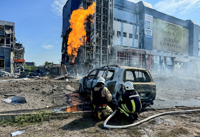 Firefighters work at a site of a Russian missile strike, amid Russia's attack on Ukraine, in Kharkiv, Ukraine September 1, 2024.